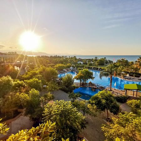 Grand Palladium Sicilia Resort&Spa Campofelice Di Roccella Esterno foto Sunrise at the resort