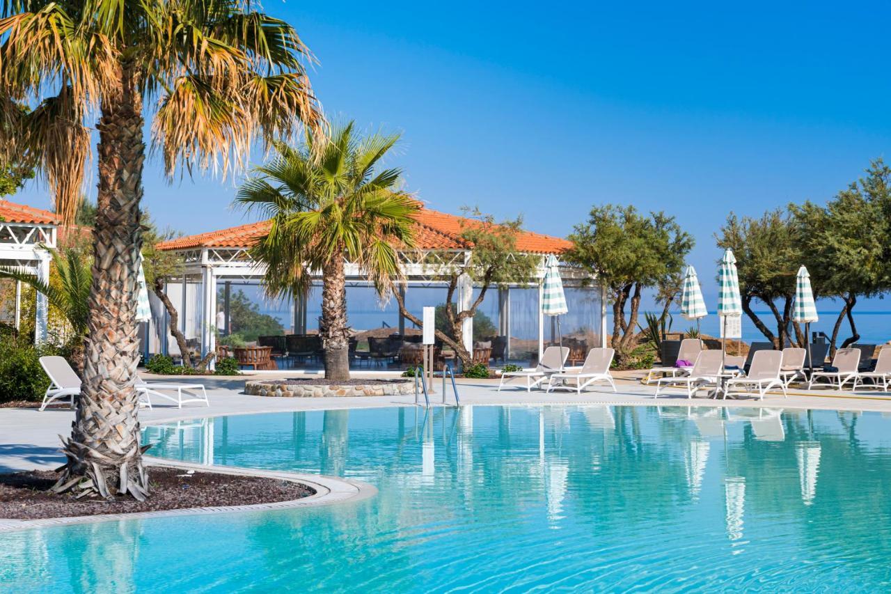 Grand Palladium Sicilia Resort&Spa Campofelice Di Roccella Esterno foto The resort's swimming pool